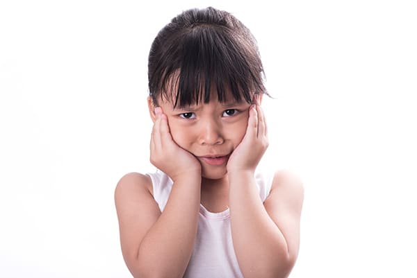 Sad Young Girl with Cavity image