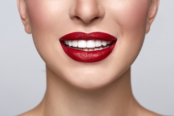 Woman with red lips smiling image